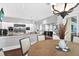 Spacious kitchen featuring stainless steel appliances, granite countertops and wine refrigerators at 5016 Givendale Ln, Tampa, FL 33647