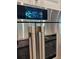 Stainless steel oven with digital display showing upper and lower oven settings at 5016 Givendale Ln, Tampa, FL 33647