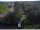 Aerial view of waterfront lot with dock at 6109 Adams St, Gibsonton, FL 33534