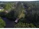 Aerial view of waterfront lot with dock at 6109 Adams St, Gibsonton, FL 33534