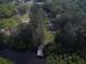 Aerial view of property with dock and surrounding mangroves at 6109 Adams St, Gibsonton, FL 33534