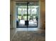 Living room with sliding doors to the patio at 12831 Oriago St, Venice, FL 34293
