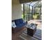 Relaxing screened patio with comfortable seating at 12831 Oriago St, Venice, FL 34293