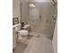 Walk-in shower with bench seating and grab bars at 12831 Oriago St, Venice, FL 34293