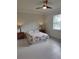 Bedroom with tile flooring and ceiling fan at 12831 Oriago St, Venice, FL 34293