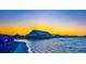 Stunning sunset view over the lagoon and beach club at 32112 Powderpuff Mimosa Dr, San Antonio, FL 33576