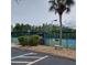 Community tennis courts with ample parking at 8049 Sanguinelli Rd, Land O Lakes, FL 34637