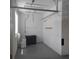 Garage with additional storage shelving and flooring at 8049 Sanguinelli Rd, Land O Lakes, FL 34637