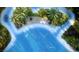 Crystal Lagoon amenity with beach and paddle boards at 10368 Honey Hammock Way, San Antonio, FL 33576