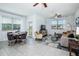 Bright dining area with a table and chairs, adjacent to living room at 10384 Honey Hammock Way, San Antonio, FL 33576