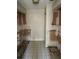 A kitchen needing renovation, showing damage at 303 E Wellington Ct # 59, Tampa, FL 33604