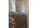 Unfinished living room with concrete flooring at 303 E Wellington Ct # 59, Tampa, FL 33604
