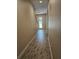 Bright hallway with tile flooring and access to other rooms at 16320 Hyde Manor Dr, Tampa, FL 33647