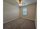 Bright bedroom with ceiling fan and neutral carpeting at 16320 Hyde Manor Dr, Tampa, FL 33647