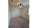 Bright bedroom with ceiling fan and neutral carpeting at 16320 Hyde Manor Dr, Tampa, FL 33647