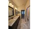 Double vanity bathroom with granite countertop at 16320 Hyde Manor Dr, Tampa, FL 33647