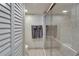 Bathroom with a large walk-in shower and tiled walls at 17980 Gulf Blvd # 205, Redington Shores, FL 33708