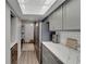 Modern kitchen with stainless steel appliances and quartz countertops at 17980 Gulf Blvd # 205, Redington Shores, FL 33708