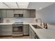 Modern kitchen with white subway tile backsplash at 17980 Gulf Blvd # 205, Redington Shores, FL 33708