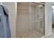 Large tiled walk-in shower with glass enclosure at 17980 Gulf Blvd # 205, Redington Shores, FL 33708