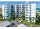 Condo building exterior with blue accents and balconies at 17980 Gulf Blvd # 205, Redington Shores, FL 33708
