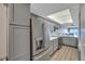 Updated kitchen featuring stainless steel appliances and quartz countertops at 17980 Gulf Blvd # 205, Redington Shores, FL 33708