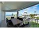 Large balcony overlooking ocean, with patio furniture and stunning views at 17980 Gulf Blvd # 205, Redington Shores, FL 33708