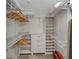 Large walk-in closet with ample shelving and hanging space at 17980 Gulf Blvd # 205, Redington Shores, FL 33708