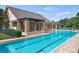 Resort-style pool with a large sundeck at 3001 Silvermill Loop, Land O Lakes, FL 34638