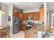 Kitchen boasts stainless steel appliances and granite countertops at 3001 Silvermill Loop, Land O Lakes, FL 34638