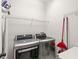 Laundry room with side-by-side washer and dryer at 3001 Silvermill Loop, Land O Lakes, FL 34638