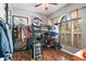 Bedroom with a lofted bed, ample storage, and window at 3001 Silvermill Loop, Land O Lakes, FL 34638