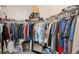 Large walk-in closet with ample hanging space and shelving at 3001 Silvermill Loop, Land O Lakes, FL 34638