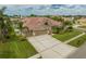 Single Gathering home with three car garage and mature landscaping at 10301 Manta Way, Tampa, FL 33615
