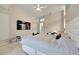 Main bedroom with king-size bed and TV at 10301 Manta Way, Tampa, FL 33615