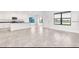 Open concept living space with a modern kitchen and lots of natural light at 7002 162Nd E Pl, Parrish, FL 34219