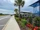 Community playground featuring a blue slide, covered seating area, landscaping and well maintained grounds at 7002 162Nd E Pl, Parrish, FL 34219