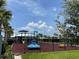 Outdoor playground featuring slides and play equipment for recreational fun and enjoyment at 7002 162Nd E Pl, Parrish, FL 34219