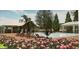 Rendering of community pool with lounge chairs, covered gazebo and decorative flowers at 7002 162Nd E Pl, Parrish, FL 34219