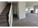 Modern staircase connecting to a spacious area of the home at 7002 162Nd E Pl, Parrish, FL 34219