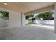 Covered patio and garage with wood ceiling at 1907 W Grace St, Tampa, FL 33607