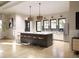 Modern kitchen with a large island and ample counter space at 12724 Tahitian Pearl Cir, Parrish, FL 34219
