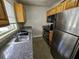 Modern kitchen with stainless steel appliances at 212 S Church Ave # 107, Tampa, FL 33609
