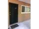 Exterior view of condo building's front door at 212 S Church Ave # 107, Tampa, FL 33609