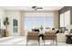 Bright living room with ample natural light and comfortable seating at 824 Tennyson Mill Cir, Tampa, FL 33619