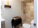 Updated bathroom with walk-in shower and modern fixtures at 12945 Morris Bridge Rd, Thonotosassa, FL 33592
