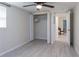 Bedroom with a double door closet and access to another room at 12945 Morris Bridge Rd, Thonotosassa, FL 33592