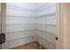 Walk-in pantry with wire shelving for storage at 12945 Morris Bridge Rd, Thonotosassa, FL 33592