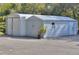 Spacious metal garage with ample storage space at 12945 Morris Bridge Rd, Thonotosassa, FL 33592