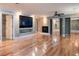 Spacious main bedroom with hardwood floors, fireplace and large closets at 12945 Morris Bridge Rd, Thonotosassa, FL 33592